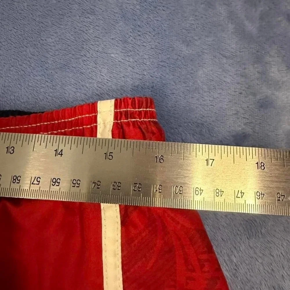 Red Speedo swim trunks with white accents men size L‎